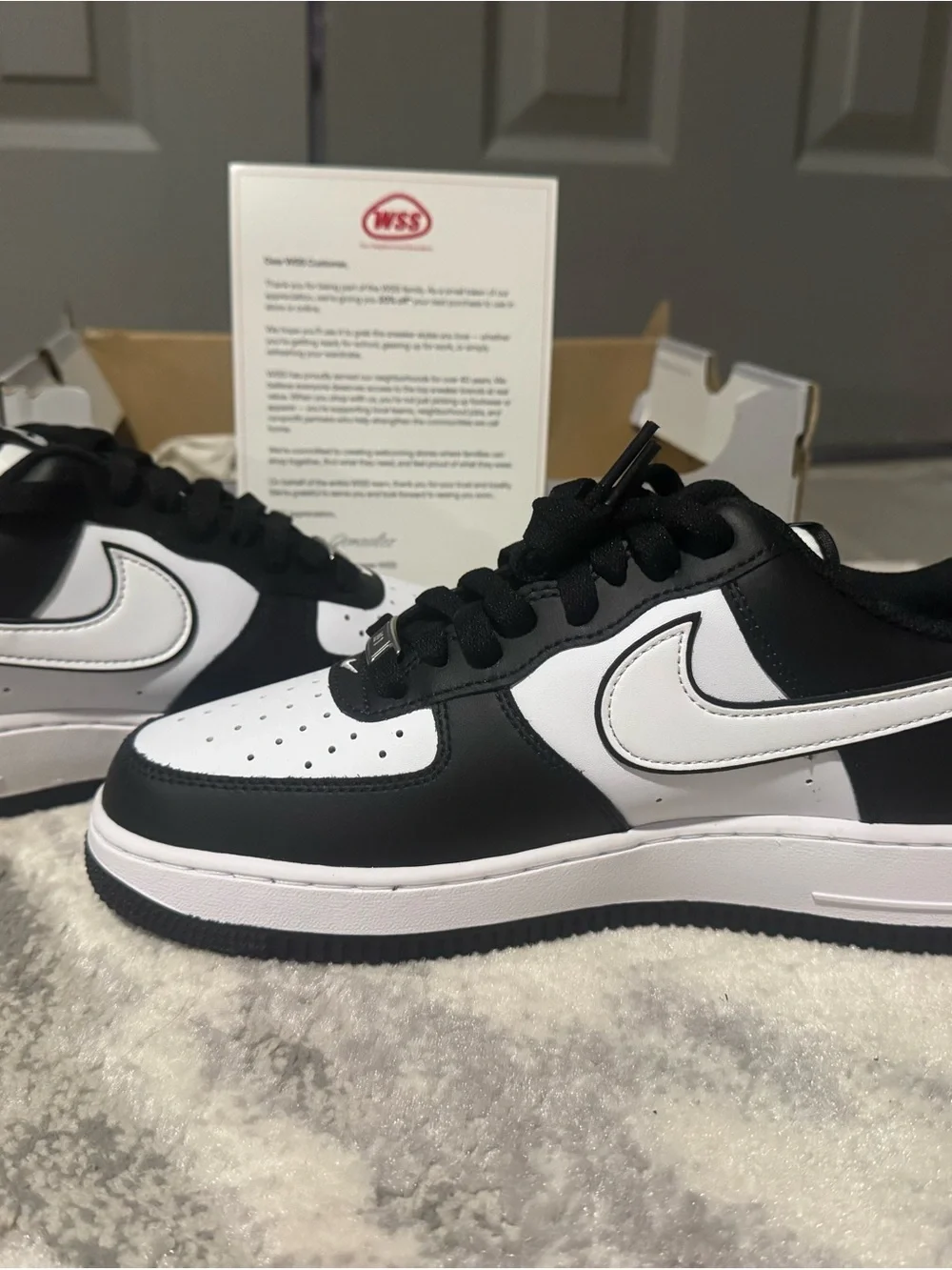 Men's Black and White Low-Top Sneakers with Contrast Swoosh